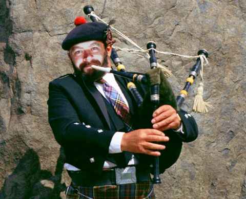 Cuyahoga Jones playing bagpipes