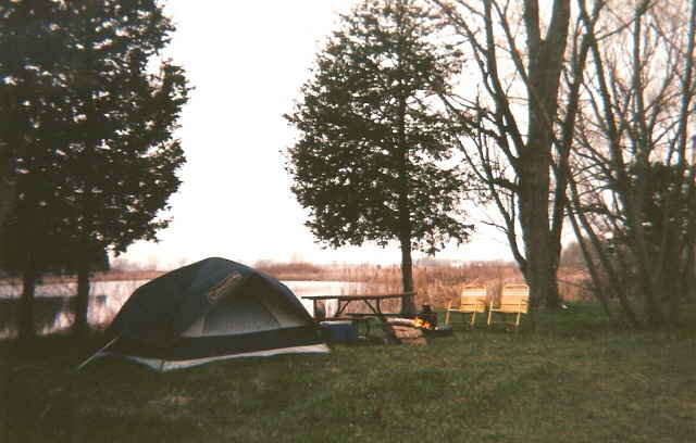 Tent, campfire, picnic table, etc. at campsite